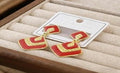 Aretes rojo